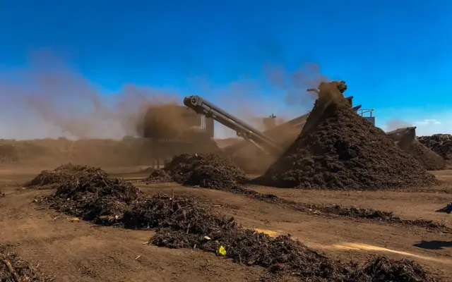 Green waste being processed into compost at a Rua-Con facility